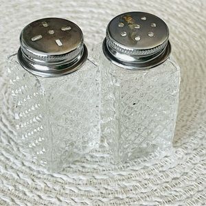 Vintage set of 2 Salt and Pepper Shakers.